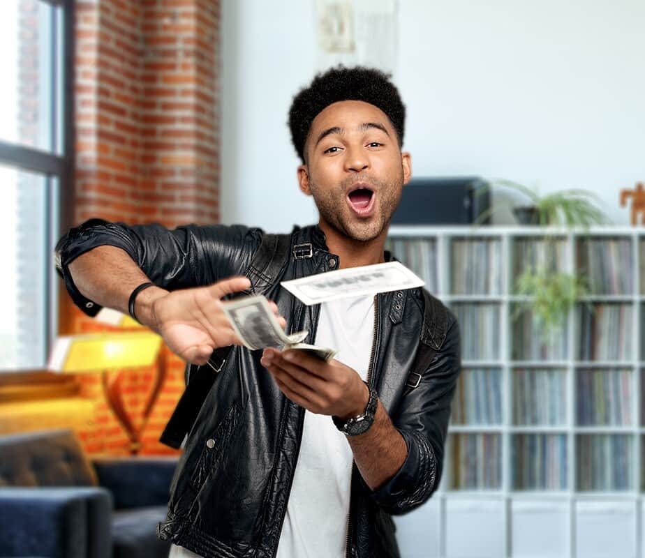 Person throwing money excitedly